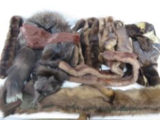 A quantity of assorted vintage fur stoles, collars and off-cuts.