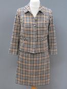 Designed and made by Rosemarie van Bree; Two piece jacket and skirt suit in tweed,