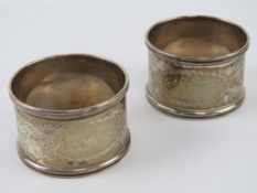 A pair of HM silver napkin rings having