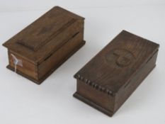 Two lidded oak boxes, one having P carve