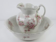 A two-piece transfer printed wash jug an