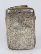 A HM silver cigarette case having scroll