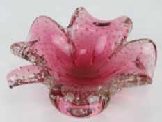 An art glass bowl in the form of a four