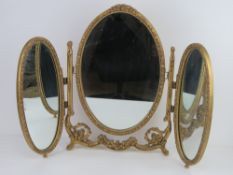 A c1960s tryptic dressing table mirror s