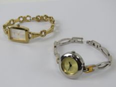 Two Guess ladies wristwatches.