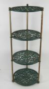 A green painted metal kitchen four tier