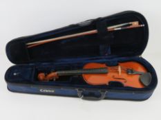 A Cathedral 1/2 size violin with bow, in
