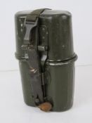 A post war German mess tin assembly with straps.