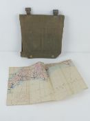 A canvas navigator's pouch having map of English coastline and Channel, dated 1944.