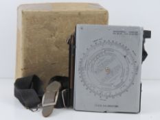 A WWII British navigational computor Mark III in original packaging.