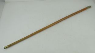 A British Military swagger stick having white metal finial with Royal Army Service Corp emblem upon,