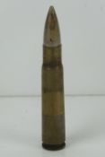 A rare inert .50 Vickers unstruck round, 11cm in length.