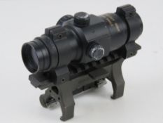 A Hakko Red Rot Combat Optic on Heckler and Koch quick detach STANAG claw mount.