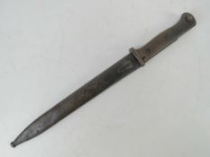 A WWI German K98 bayonet marked for J. A. Henckels, having 25cm blade, with scabbard.