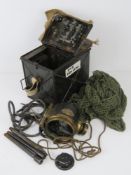 A WWI signal lamp having metal and canvas covered case having clear glass lens with green and red