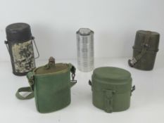 Two military mess tins, an aluminium hot water,