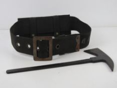 A WWI fireman's hatchet having maker's mark (indistinct) upon.