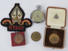 An Army Services pocket watch having white and silvered dial with subsidiary seconds dial,