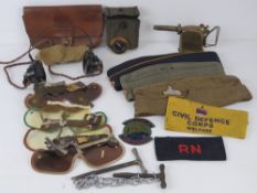 Three military side caps, one bearing Lincolnshire Regiment cap badge, Civil Defence Corp armband,