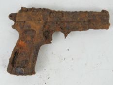A German Browning High Power Pistol in relic condition.