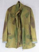 A British Dennison Para jacket, having name and possibly Royal Marine Regimental number upon.