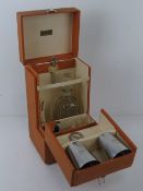 A rare Brexton leatherette covered car decanter set in original box,