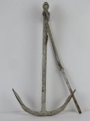 A vintage ships anchor with standing pin, approx 54cm high.