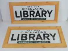 A pair of pine framed ceramic signs 'See Our Circulating Library Branch of the Argosy',