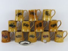 Twelve assorted Wade vintage car flagons, together with a Wade saucer dish.