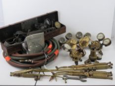 An assorted quantity of vintage Oxycetelen torches and welding items.