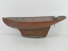 A vintage model ship hull, for refurbishment, having heavy keel.