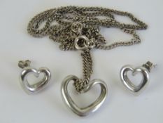 A delightful Mappin & Webb suite of HM silver jewellery comprising stud earrings and pendant on