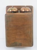 A vintage bell box having twin hemispherical bells.
