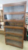 A six sectional Globe Wernicke library bookcase, each section bearing Globe Wernicke transfer,