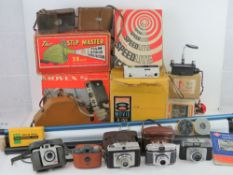 A quantity of assorted 1960s and 1970s camera and cine equipment including;