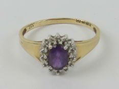 A 9ct gold amethyst and diamond ring,