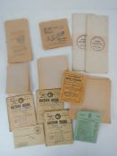 A quantity of assorted vintage unused shop paper bags,