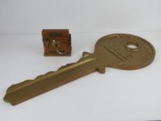 An oversized advertising shop window Yale key measuring 78 x 31cm.