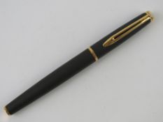 A Waterman fountain pen having original medium nib, in black leather case.