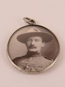 A hallmarked silver Victorian double sided glazed locket having Queen Victoria and Lord