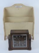 A vintage cream painted two sectional magazine rack bearing label 'British Made Haxyes' 41cm wide.