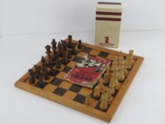 A vintage carved wooden chess set by Staunton in original box,