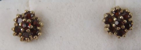 A pair of 9ct gold cluster earrings with butterfly backs, hallmarked to post.