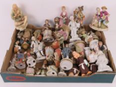 A quantity of assorted Continental ceramic figurines.