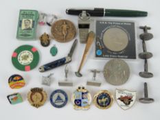 A quantity of assorted badges, coins, cufflinks, etc.