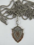 A guard chain stamped 800 to the clasp, 73cm in length including clasp (total chain length 142cm).