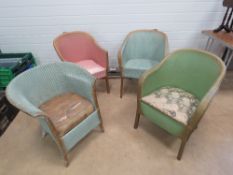 Four Lloyd Loom style painted chairs.