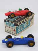 A Triang Scalextric Lotus MM (C67) in red with original box.