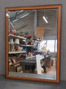 A contemporary wooden framed bevelled ed