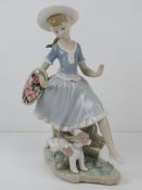 Lladro figurine of a girl with a basket